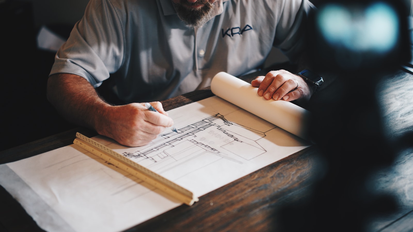 Engineers reviewing technical plans