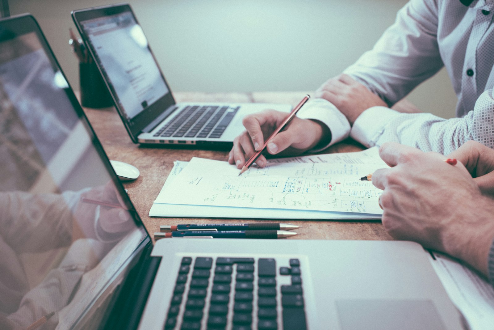 Professional reviewing career materials in a workplace, not a combat setting